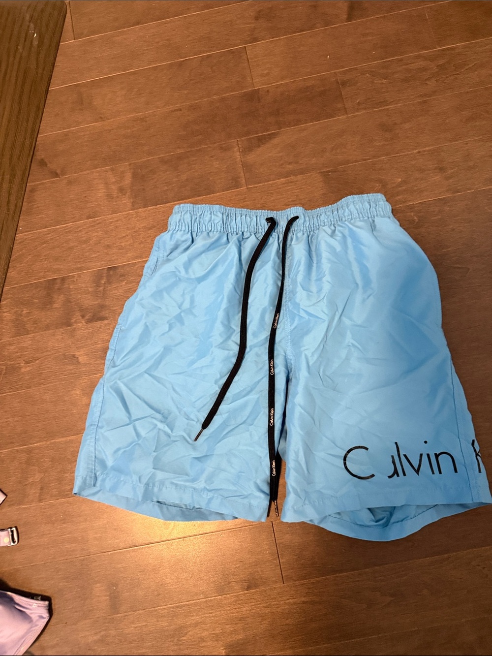 Calvin Klein Sky Blue Swim Trunks with Black Drawstring